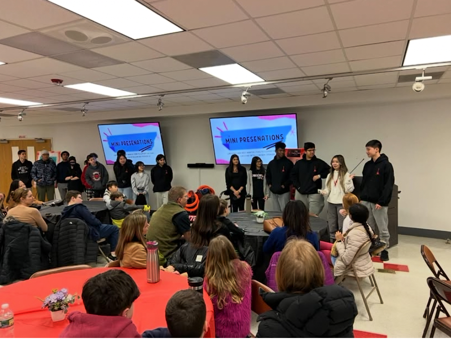 CyberCats team dinner with mini presentations and community gathering