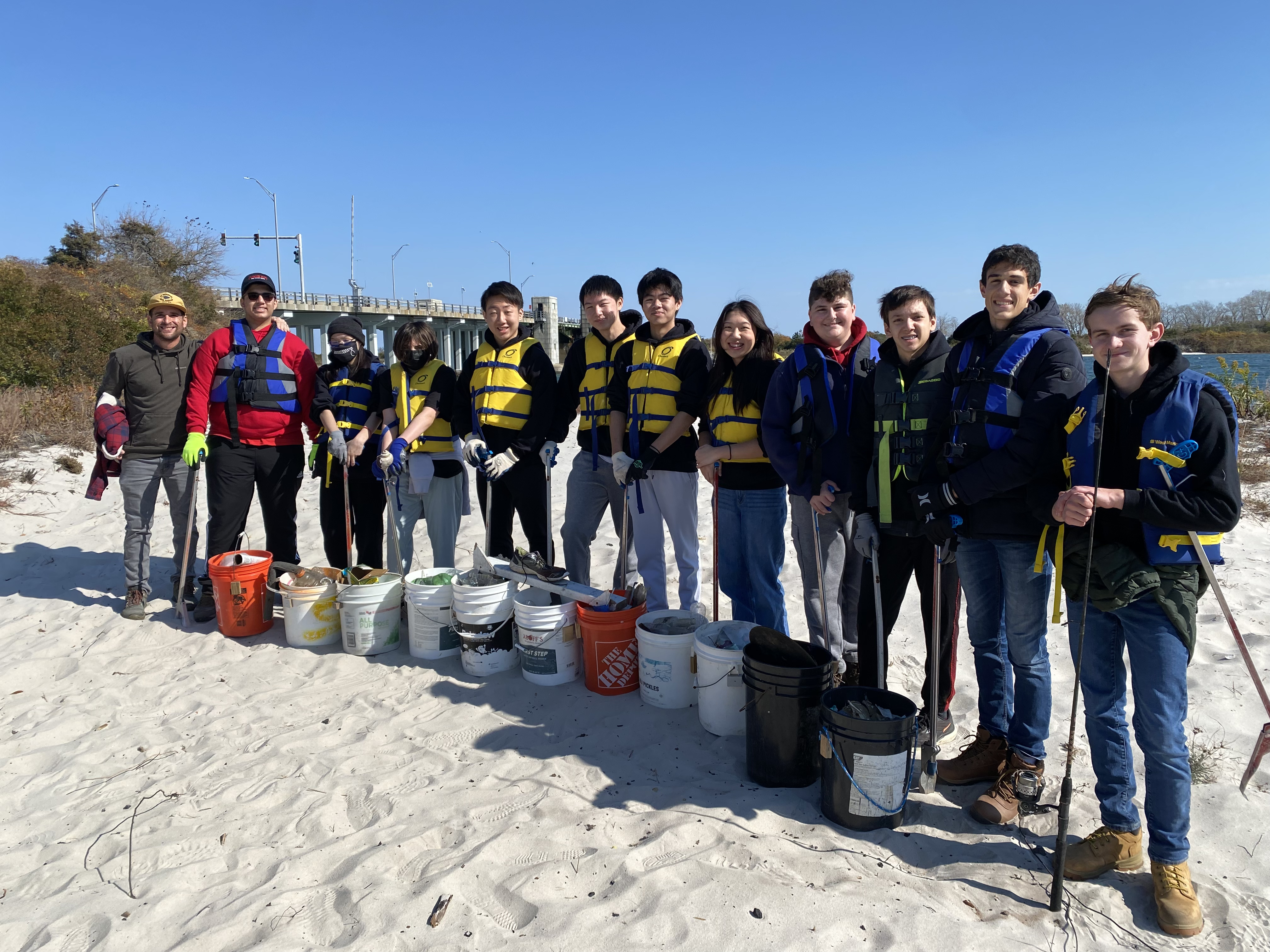 CyberCats team beach cleanup volunteer work on Long Island shores